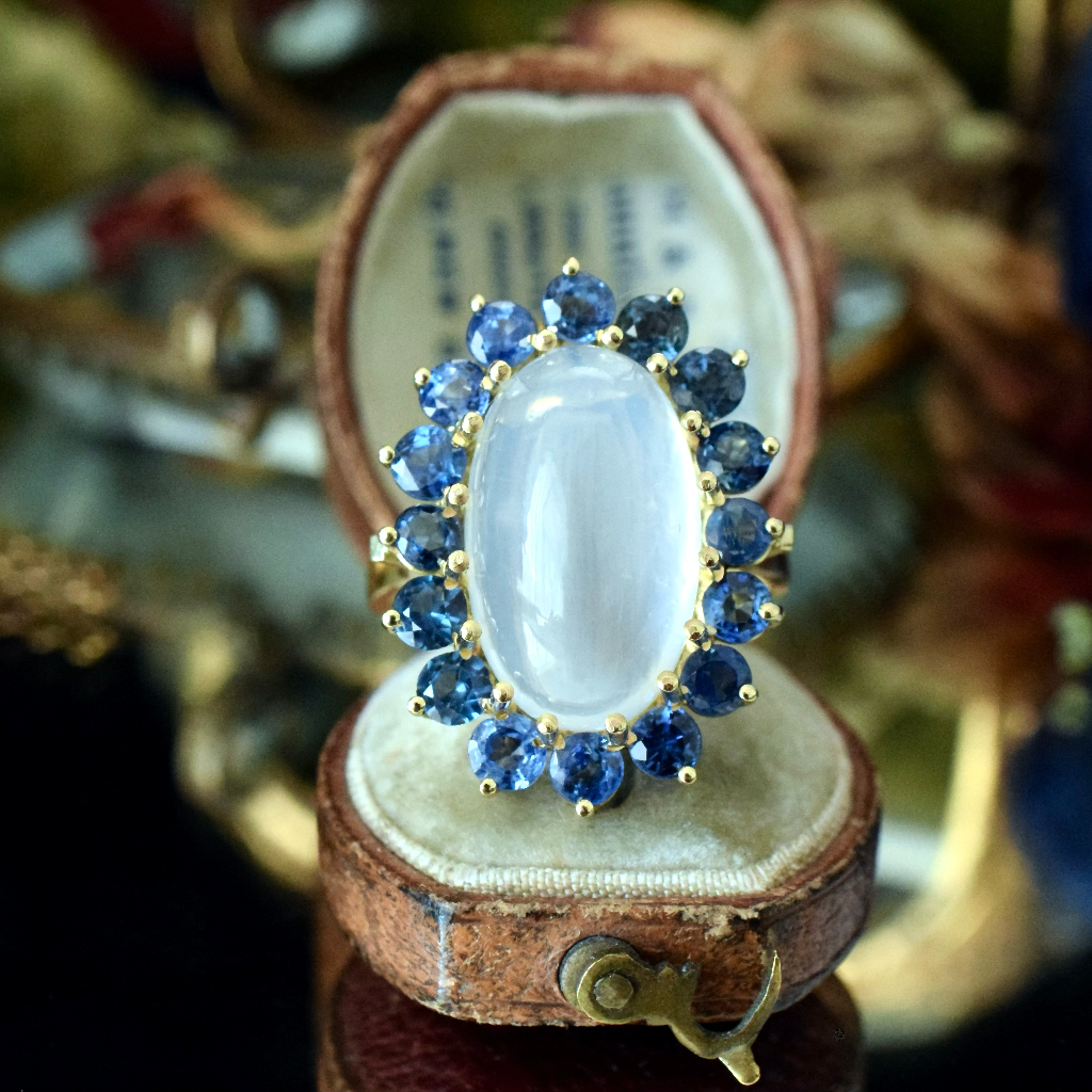 Modern 18ct Yellow Gold Moonstone And Sapphire Ring Independent Insurance/Retail Replacement Valuation Included For $5,250 AUD