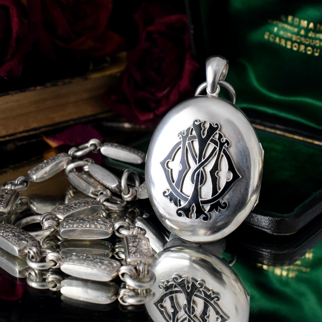Antique Victorian Sterling Silver  ‘In Memory Of’ Enamel Locket and Floral Engraved Bookchain Circa 1890