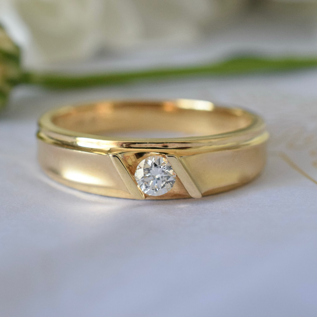 Modern 18ct Yellow Gold Tension Set 0.18ct Diamond Solitaire Ring