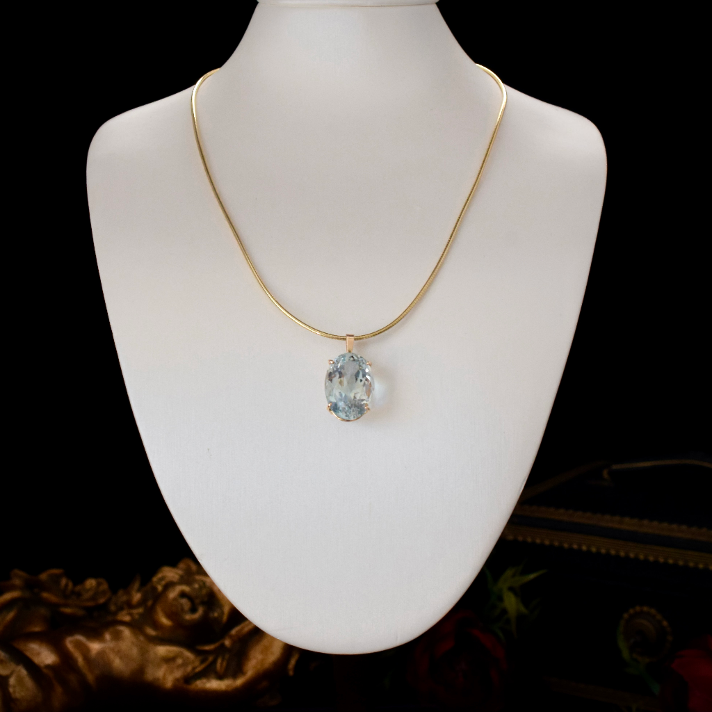 Modern 9ct Yellow Gold Blue Topaz Pendant