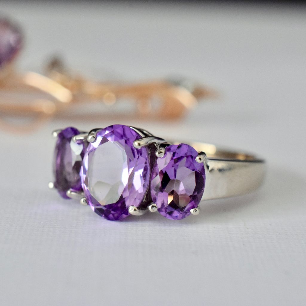 Modern 9ct White Gold Oval Amethyst Trilogy Ring