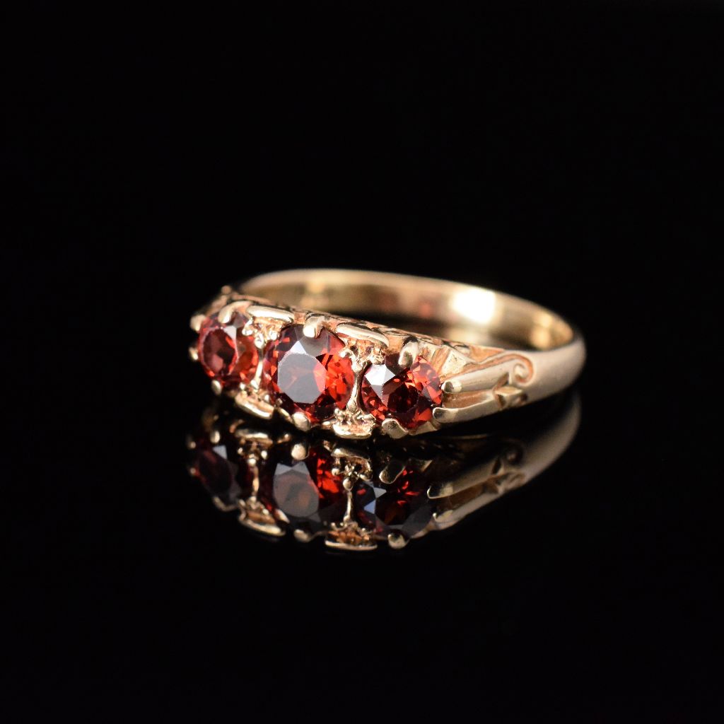 Charming 9ct Yellow Gold Three Garnet Trilogy Ring